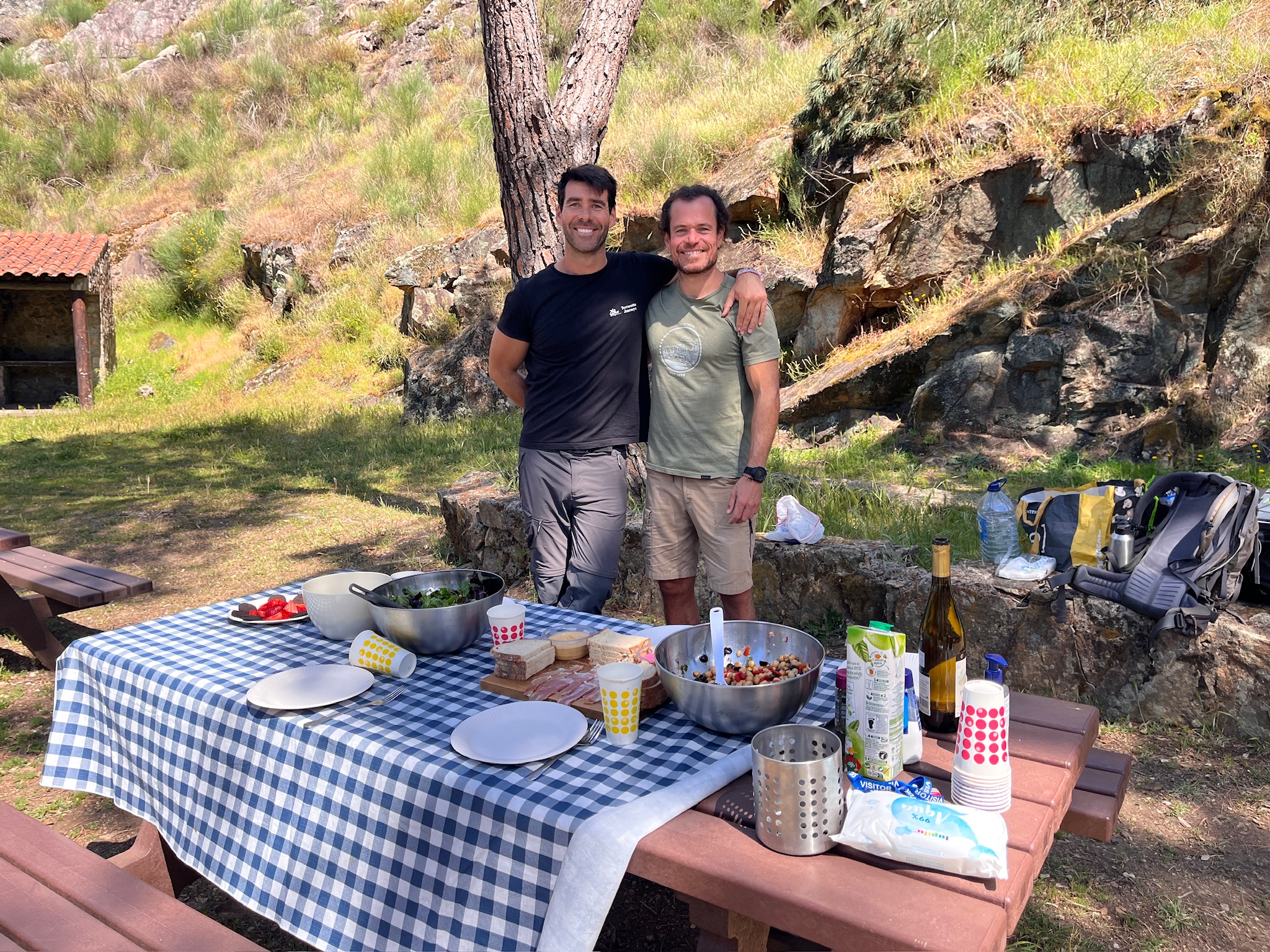 Nuno and Manuel at a trailside picnic in the Portuguese countryside